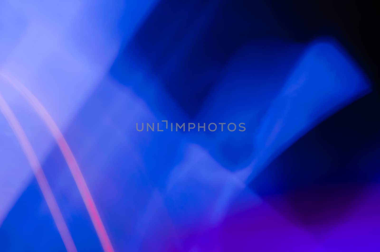 A deep blue and pink photographic abstract background