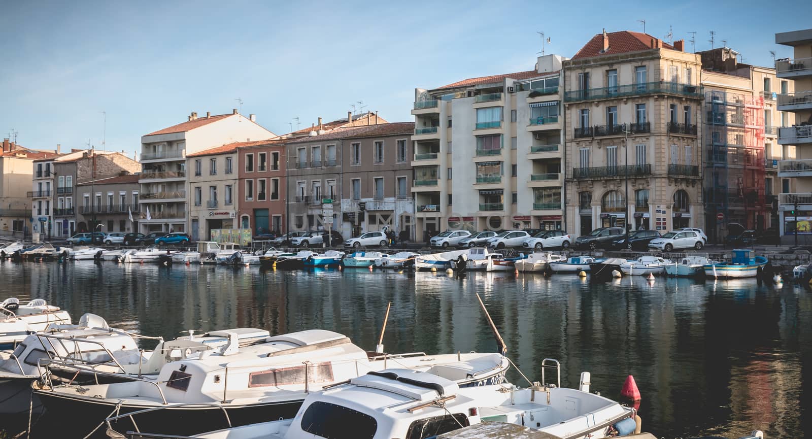 Sete, France - January 4, 2019: view of the marina in the city center where pleasure boats are parked on a winter day