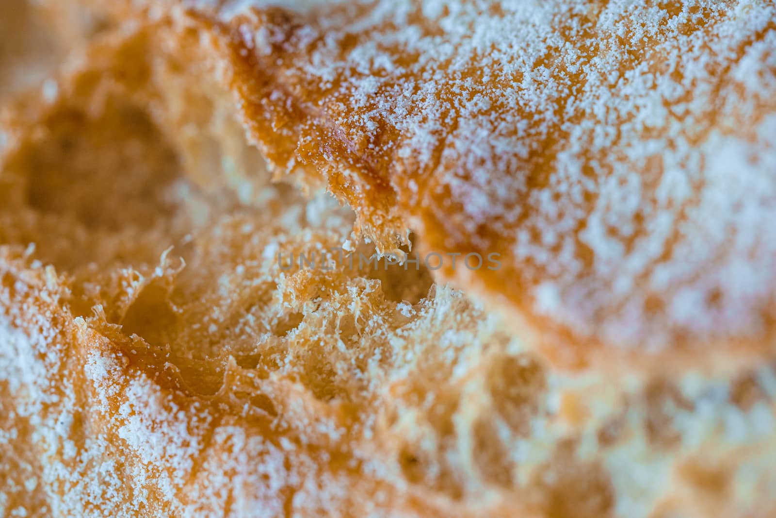 Bread texture, close view from above with shallow depth of field by tanaonte