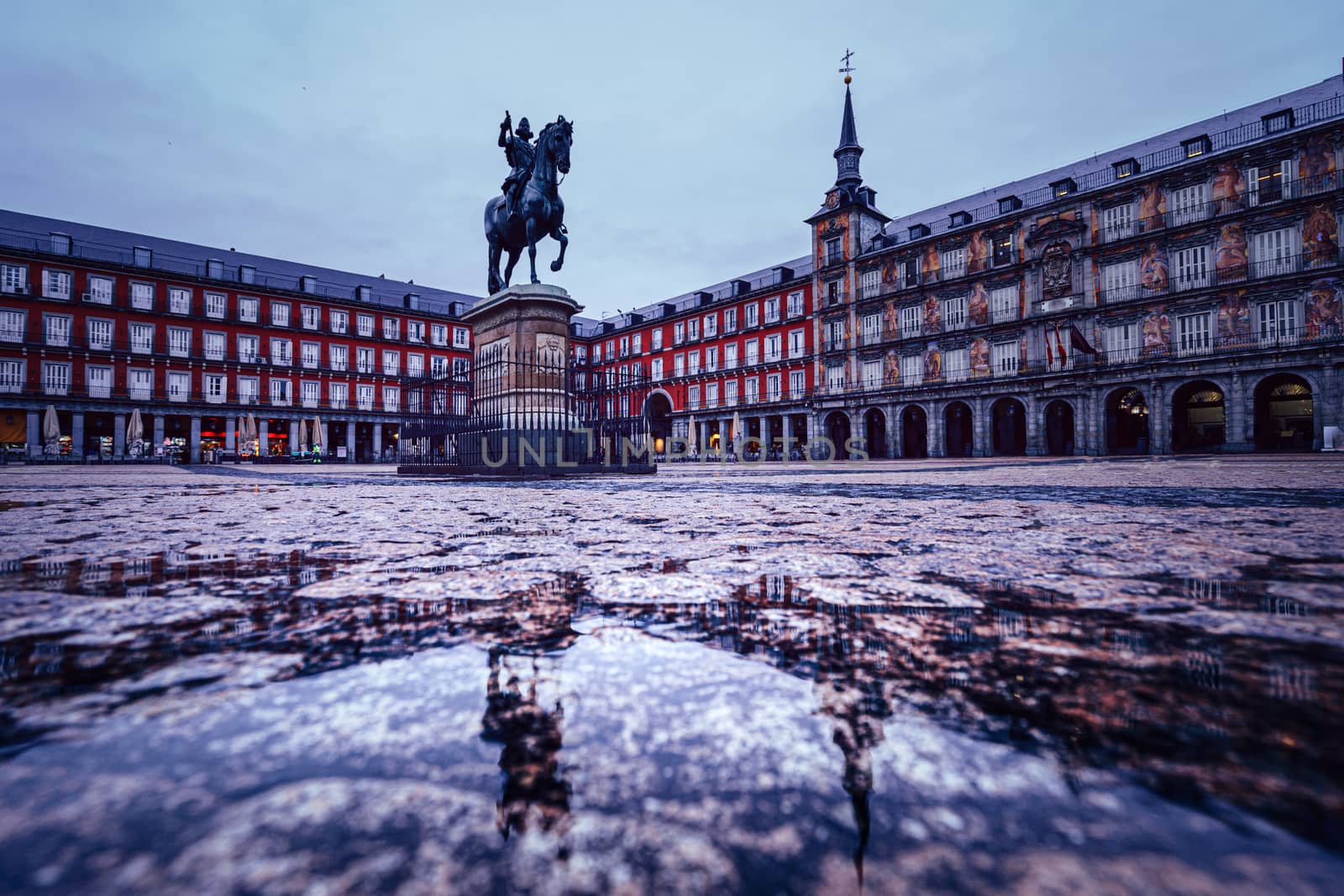 Plaza Mayor of Madrid after the storm, reflected on the ground by tanaonte