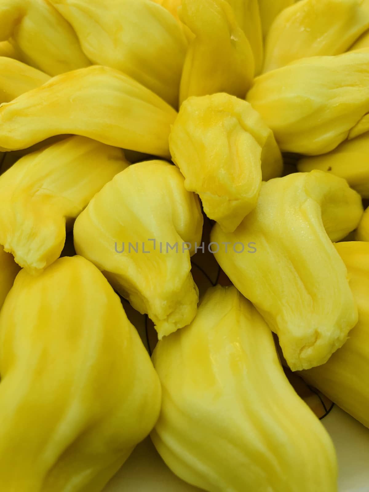 Beautiful view of Jack fruits kept in a plate for sale at market during the summer season