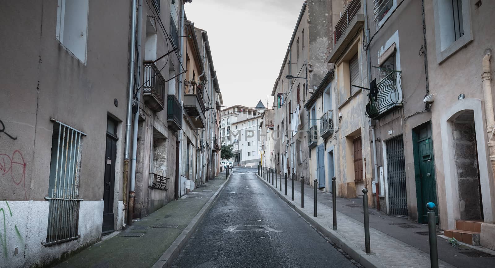 Sete, France - January 4, 2019: Architectural detail of old building typical of historic downtown on a winter day