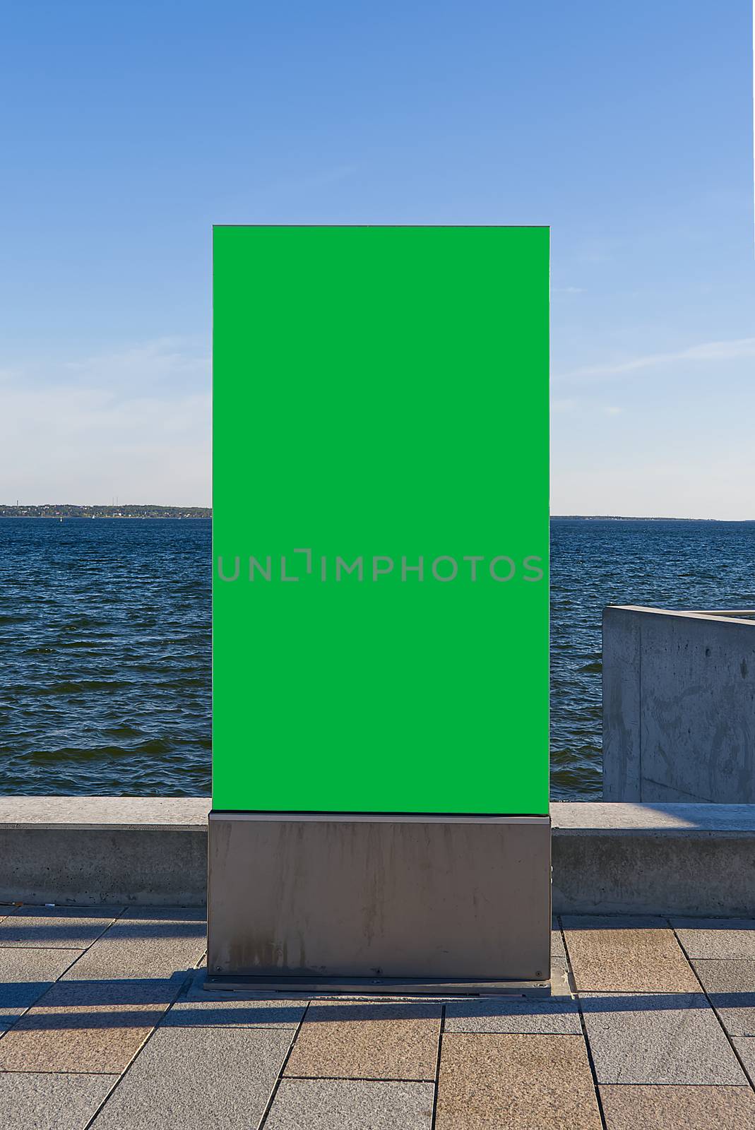 chroma key poster on a background of baltic sea. suitable for advertising. Blank billboard and outdoor advertising. chroma key Mockup poster outside. Tallinn, Estonia. by PhotoTime