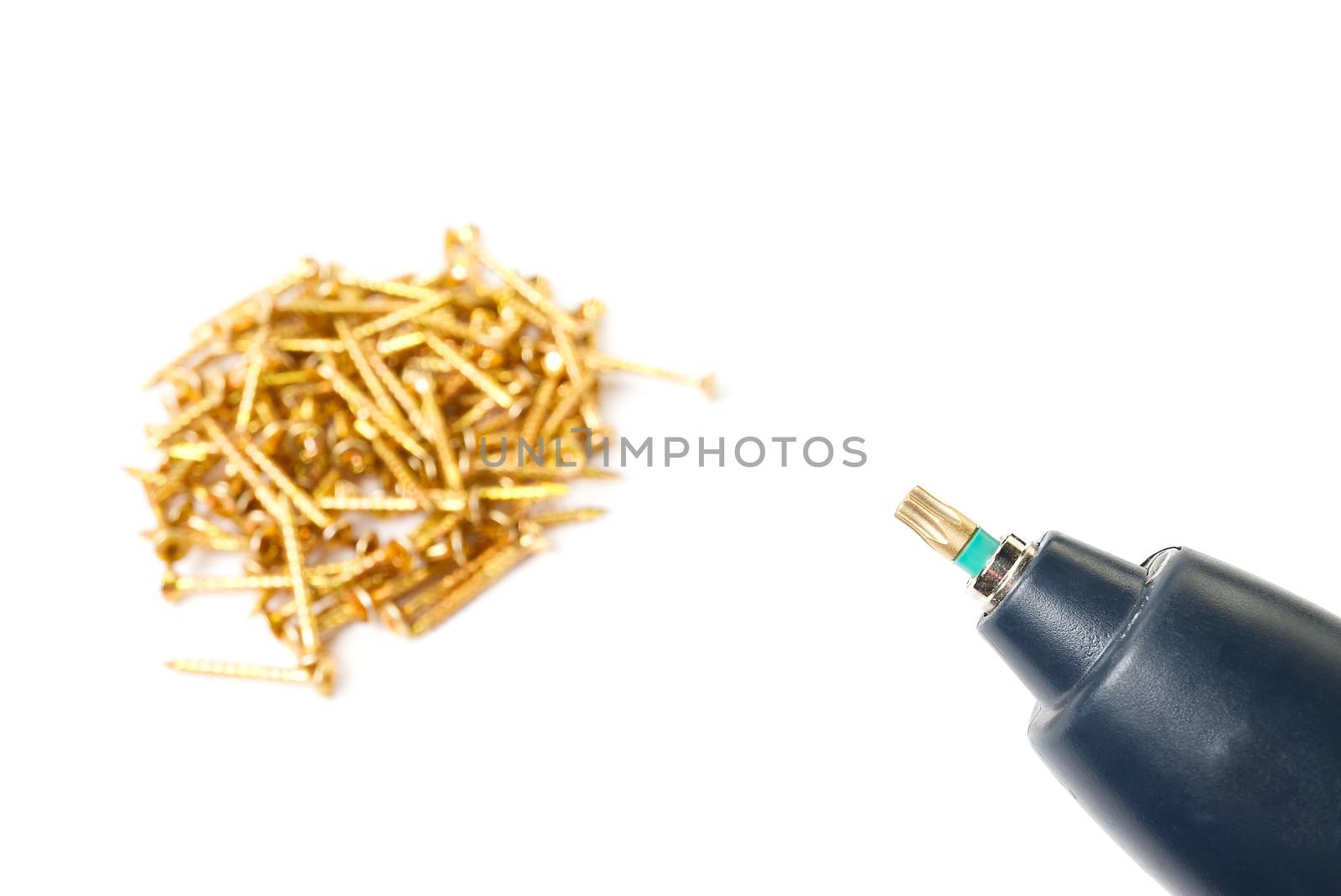 yellow zinc torx screws and electric screwdriver, isolated on white. screws for torx head bit. by PhotoTime