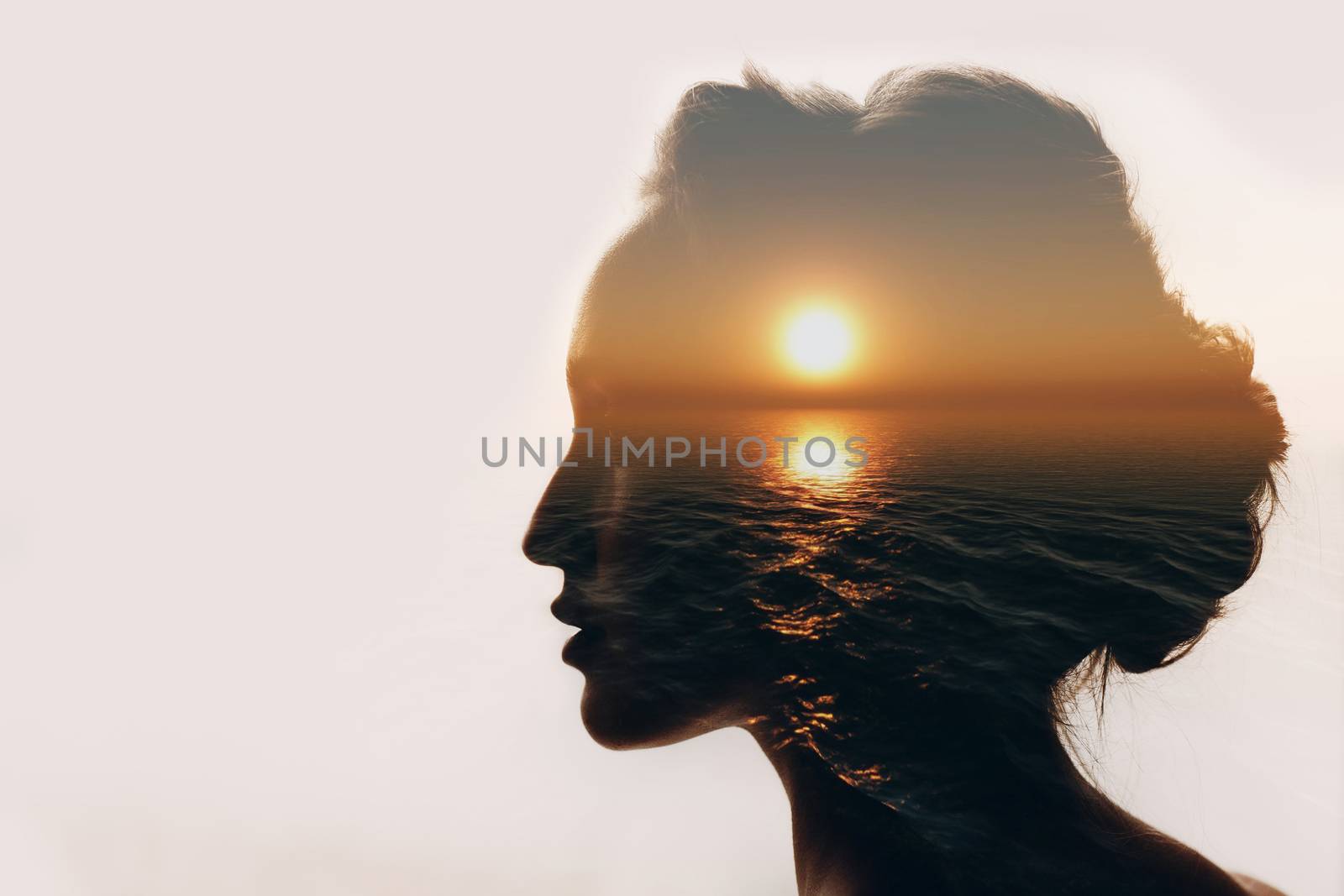 Psychology concept. Sunrise and woman silhouette. by primipil