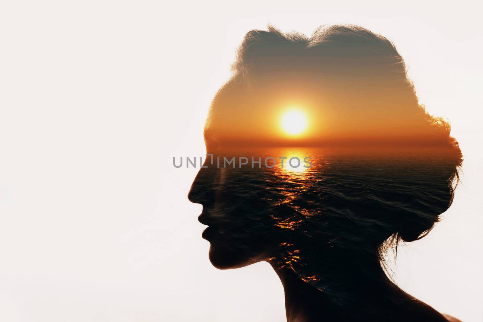 Psychology concept. Sunrise and woman silhouette.