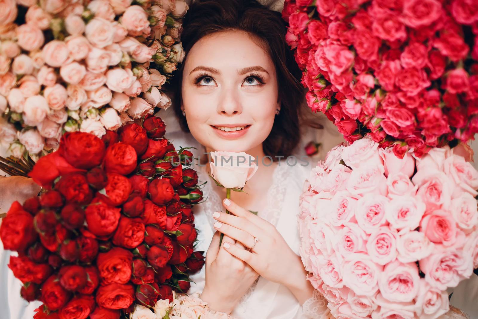 Dreaming young female and flowers. Aromatherapy by primipil