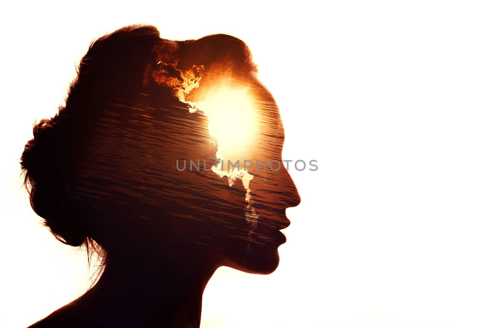 Multiple exposure portrait of a woman. The sun behind the clouds. Emotional intelligence concept.