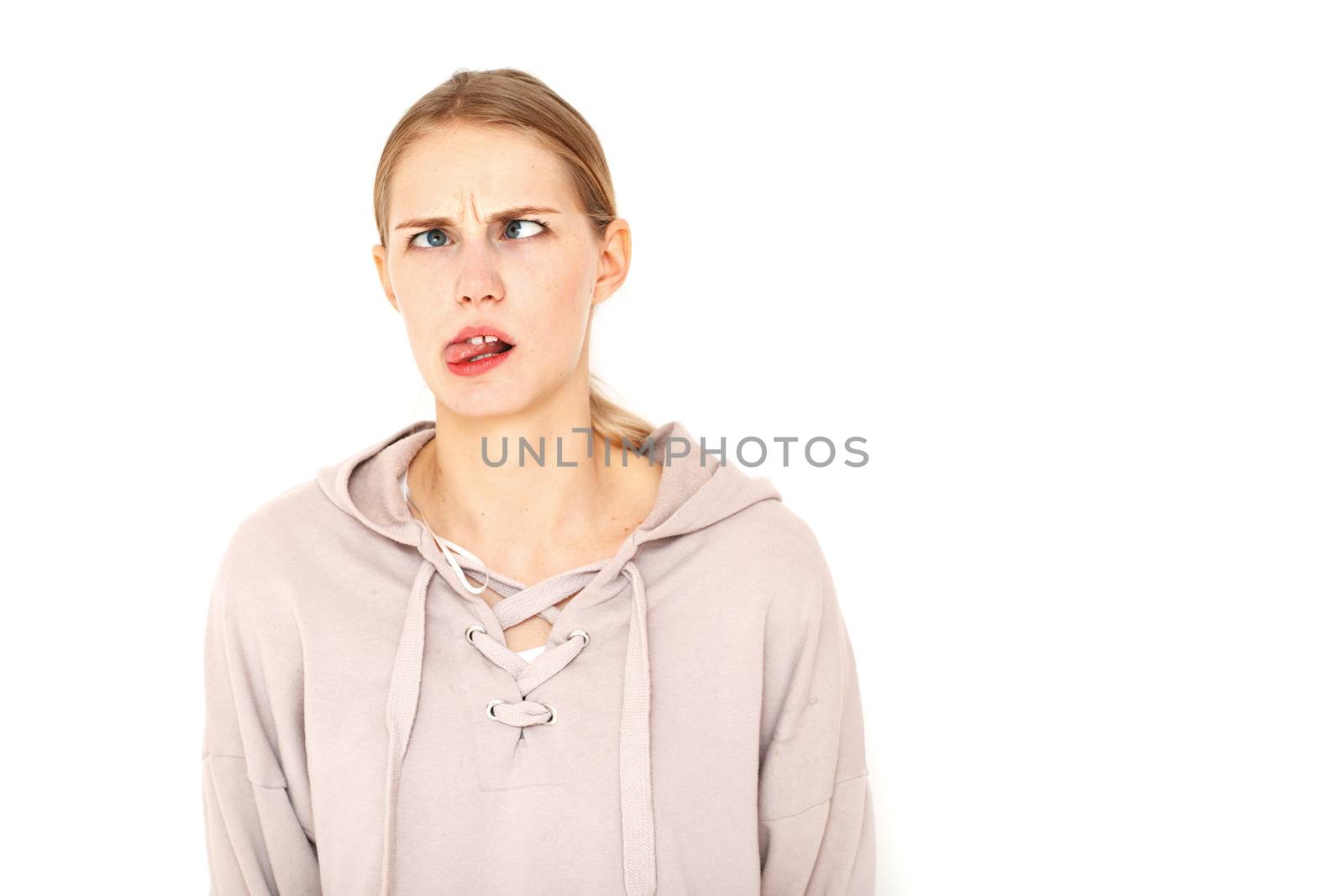Funny facial expressions of a young woman isolated white background