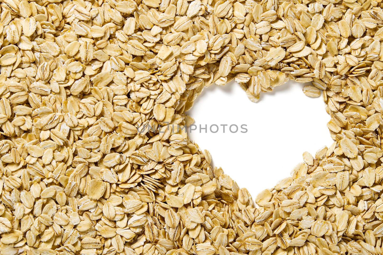 Close up of oats flakes. oats flakes macro shoot. Oatmeal flakes texture. Background of golden oat flakes. I Love Healthy food. by PhotoTime