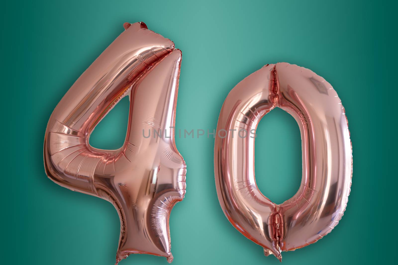 Isolated pink gold Helium Balloon in the shape of the number 40 by tanaonte