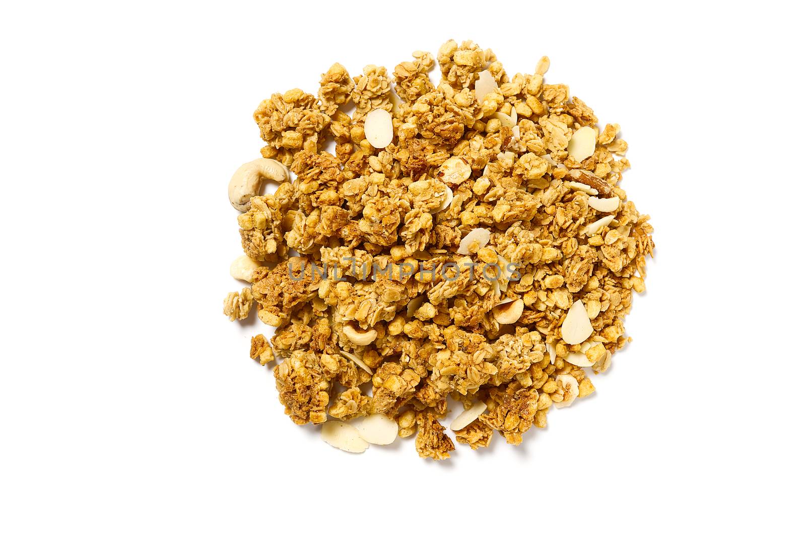 Small Granola Pile on a White Background. Small Muesli Pile with nuts isolated on white by PhotoTime
