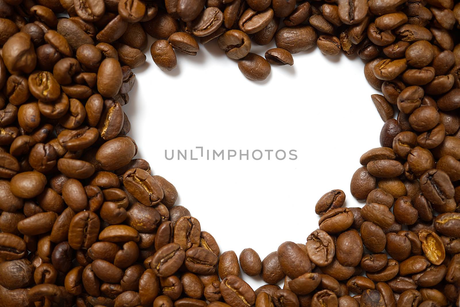 heart frame of coffee beans isolated on white background may use as background or texture. I love coffee concept.