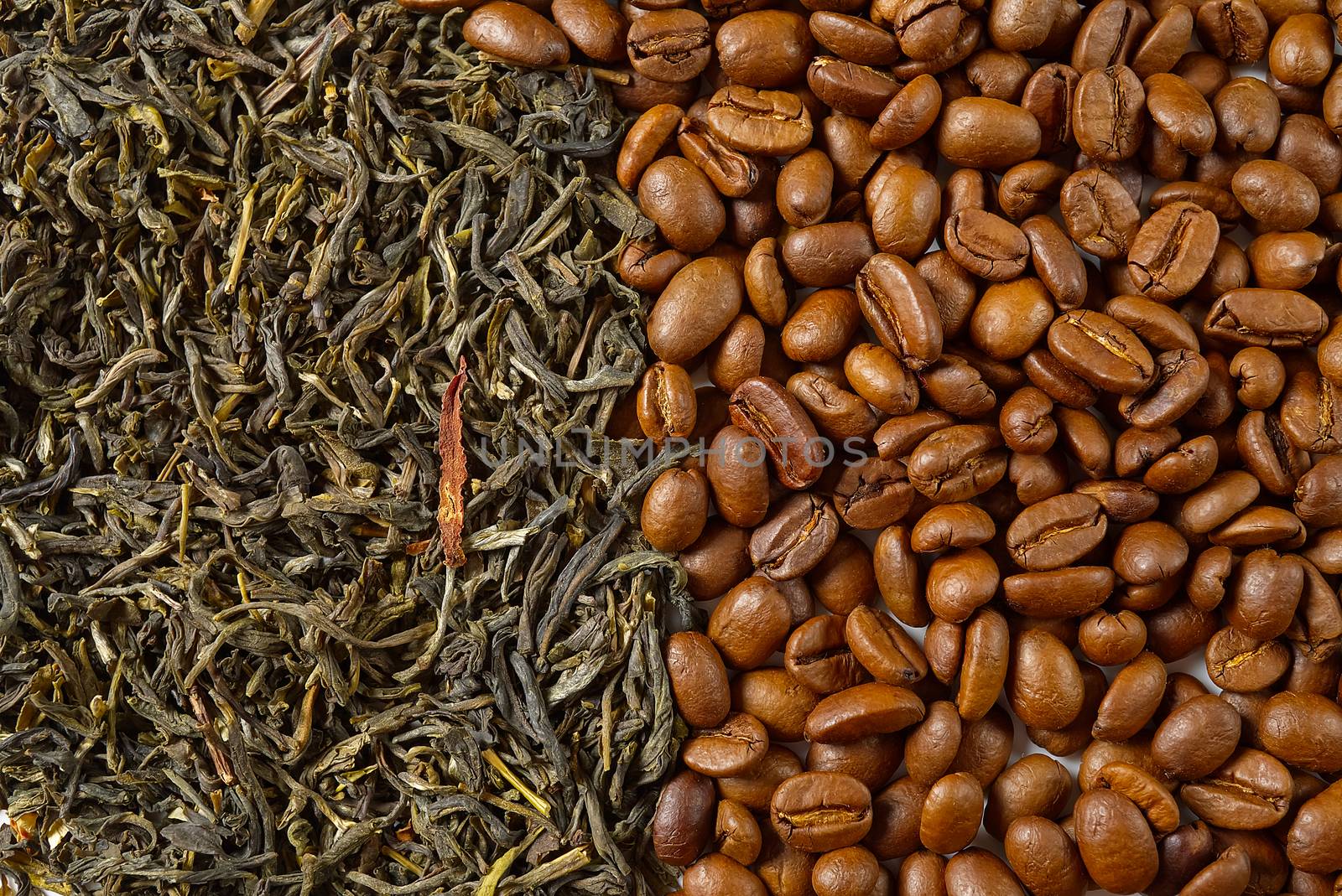 Dry leaves of green tea and fine Roasted coffee beans, top view closeup. Coffee or Green tea concept. by PhotoTime