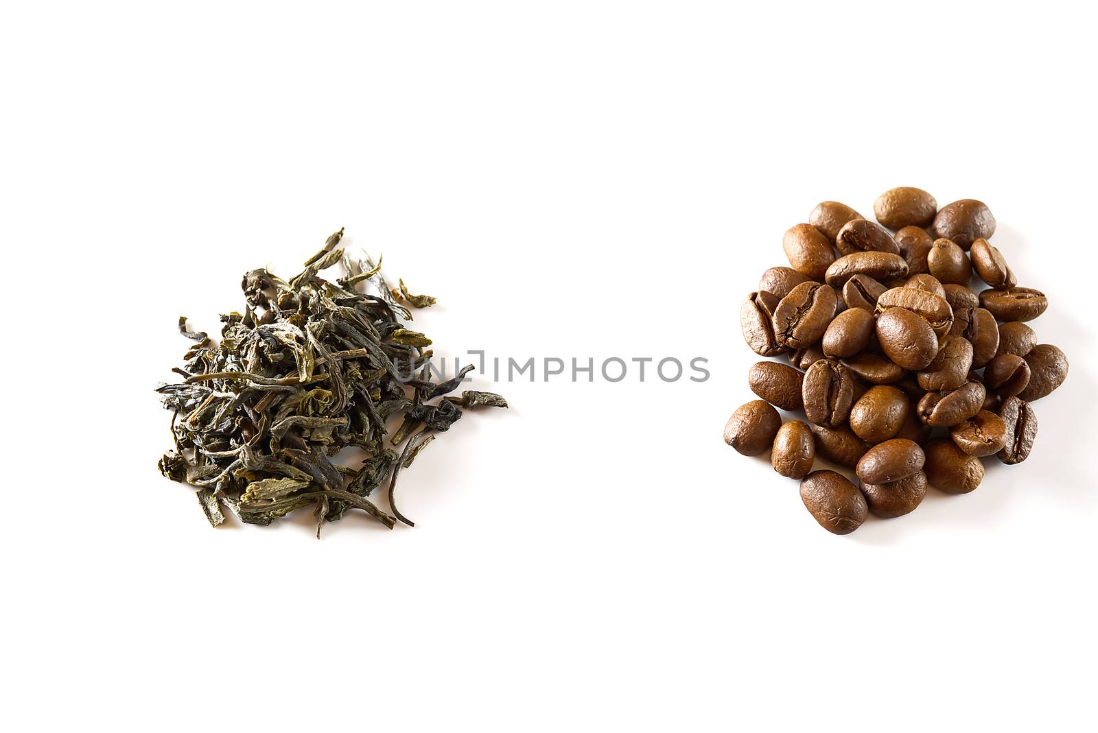 Pile of coffee beans and dry green tea leaves isolated on white background. closeup by PhotoTime