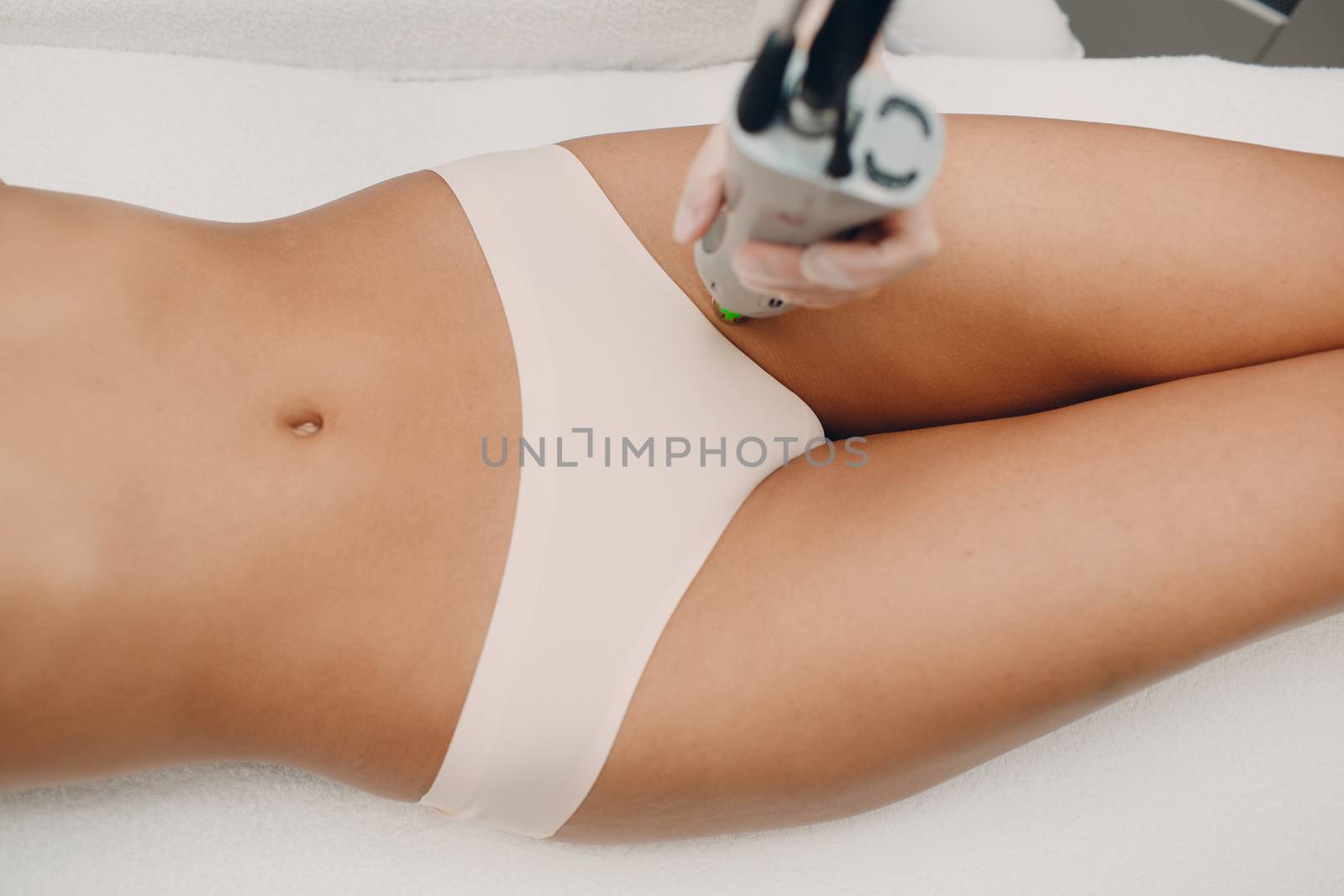 Bikini Laser epilation and cosmetology. Hair removal cosmetology procedure. Laser epilation and cosmetology. Cosmetology and SPA concept. by primipil