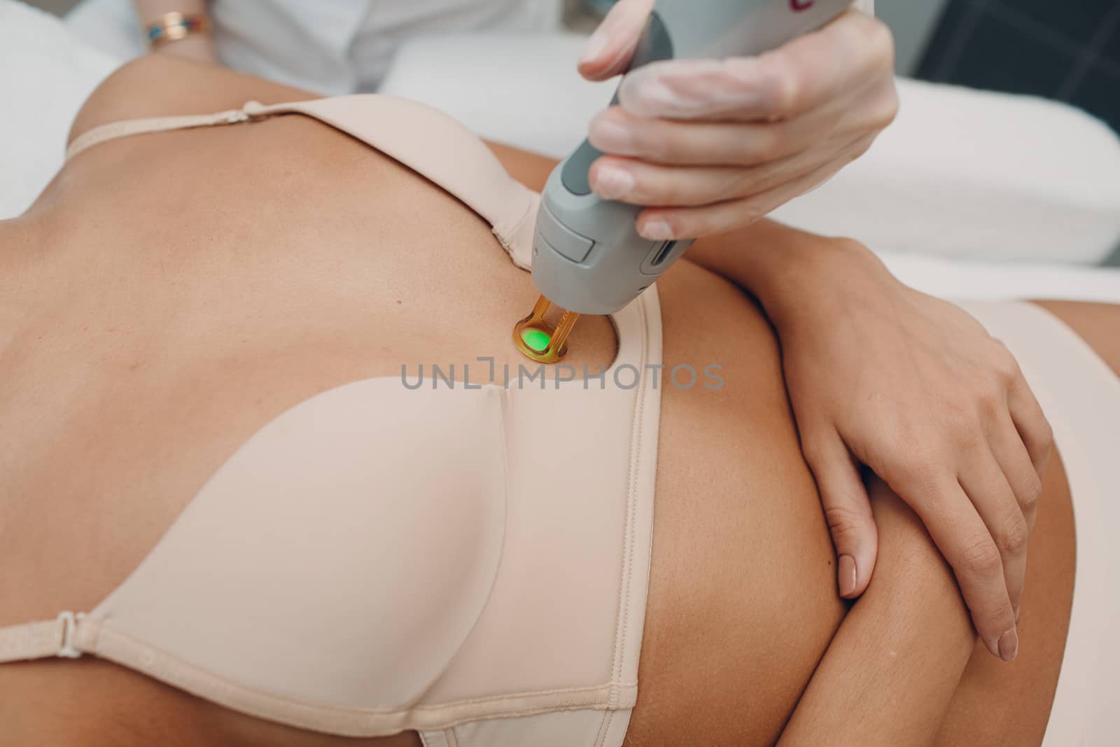 Breast Laser epilation and cosmetology. Hair removal cosmetology procedure. Laser epilation and cosmetology. Cosmetology and SPA concept. by primipil