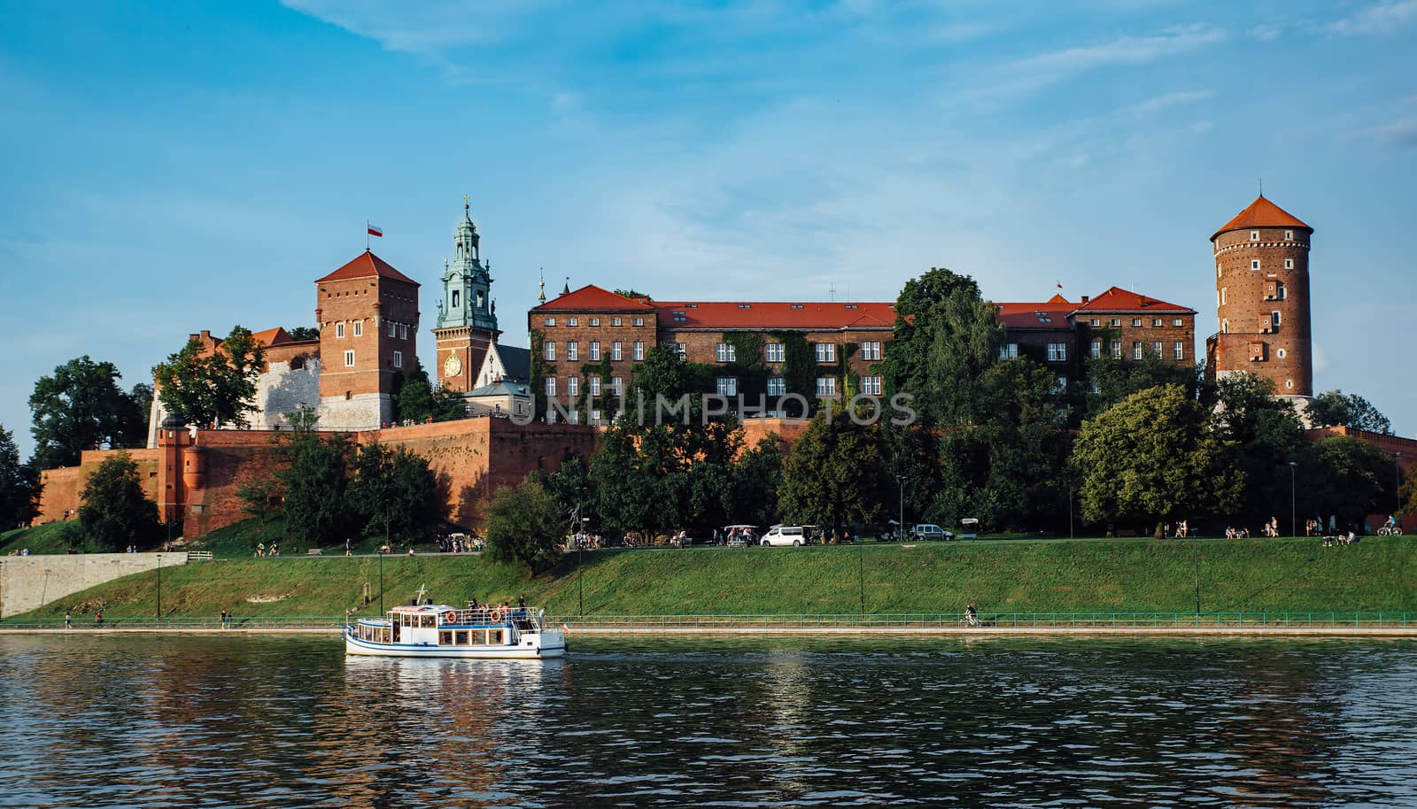 The Wawel castle in Krakow, Poland, in the foreground the Vistula river.