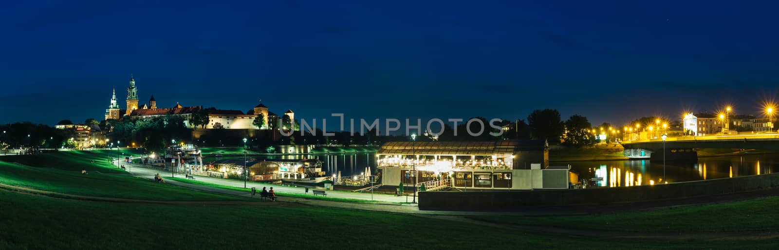 Panoramic night view of the Wawel castle in Krakow, Poland.