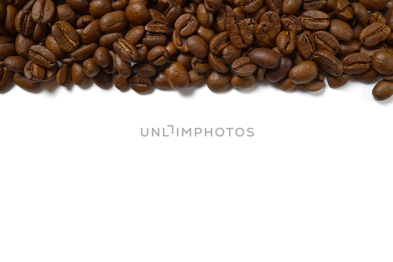 Texture of coffee beans. Roasted coffee beans background. close up Coffee beans with copy space on White background by PhotoTime