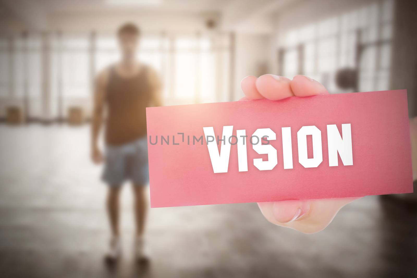 The word vision and hand showing card against 