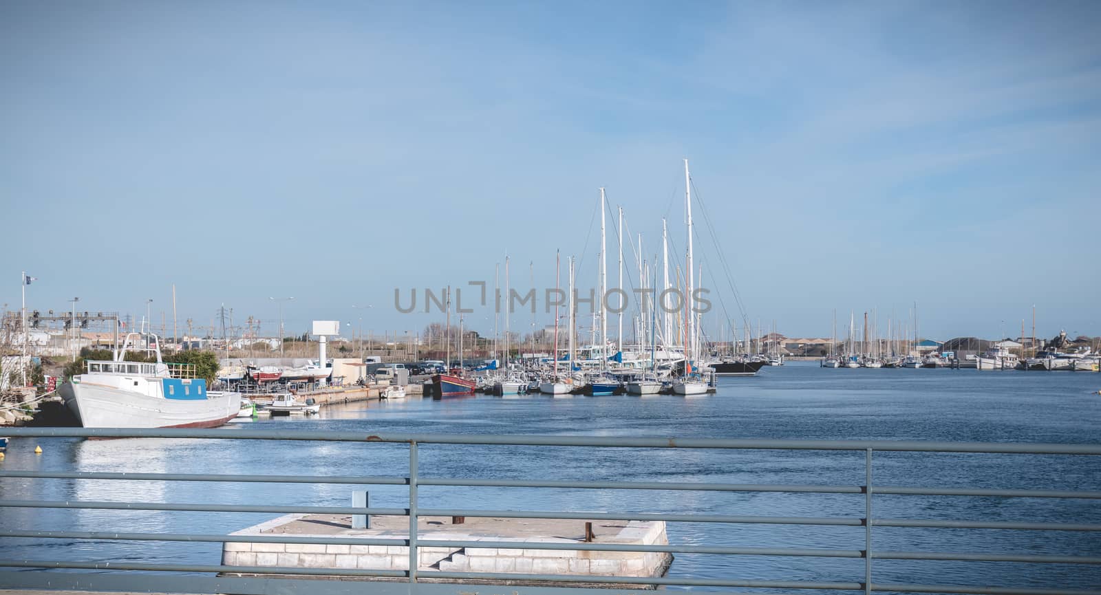 Sete, France - January 4, 2019: view of the marina in the city center where pleasure boats are parked on a winter day