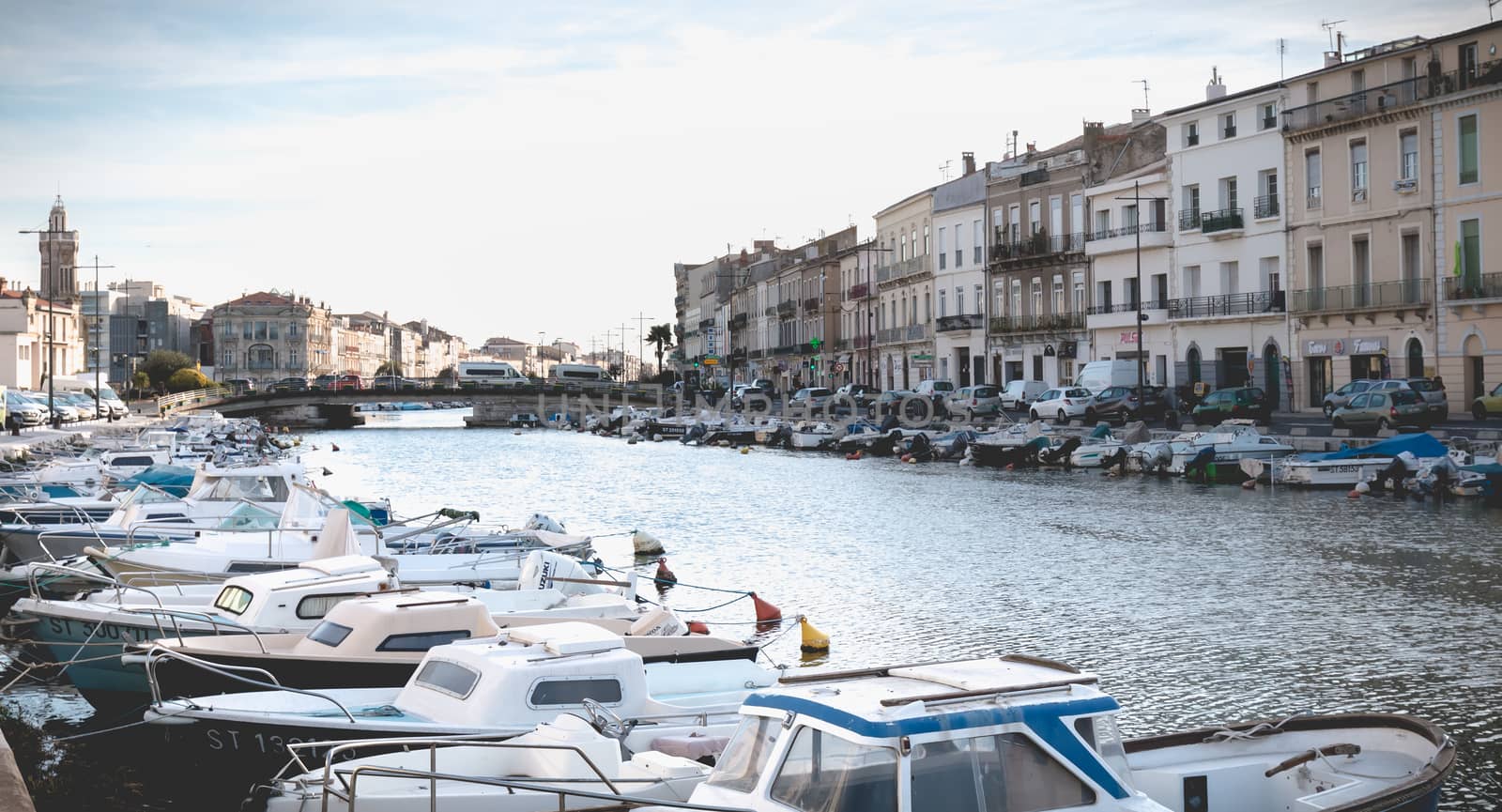 Sete, France - January 4, 2019: view of the marina in the city center where pleasure boats are parked on a winter day