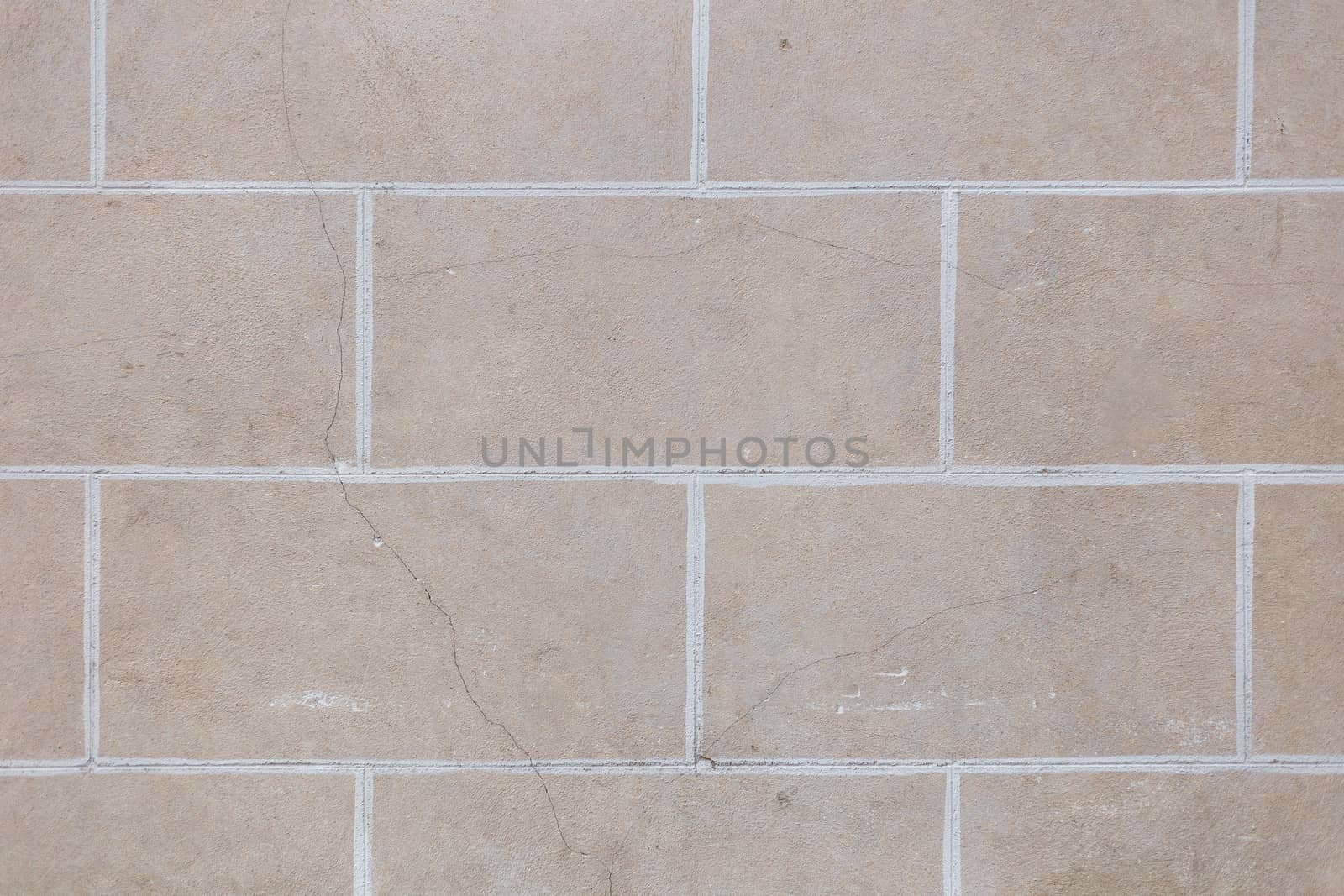 Wall pattern with bricks and cement, background texture