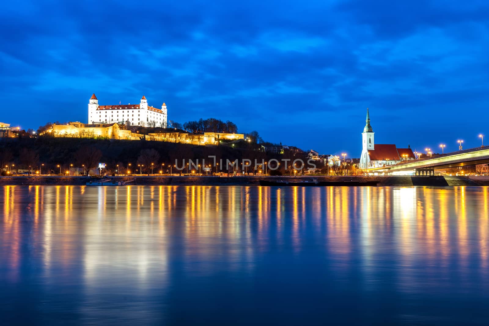 Bratislava castle and St. Martin's cathedral on a spring evening day