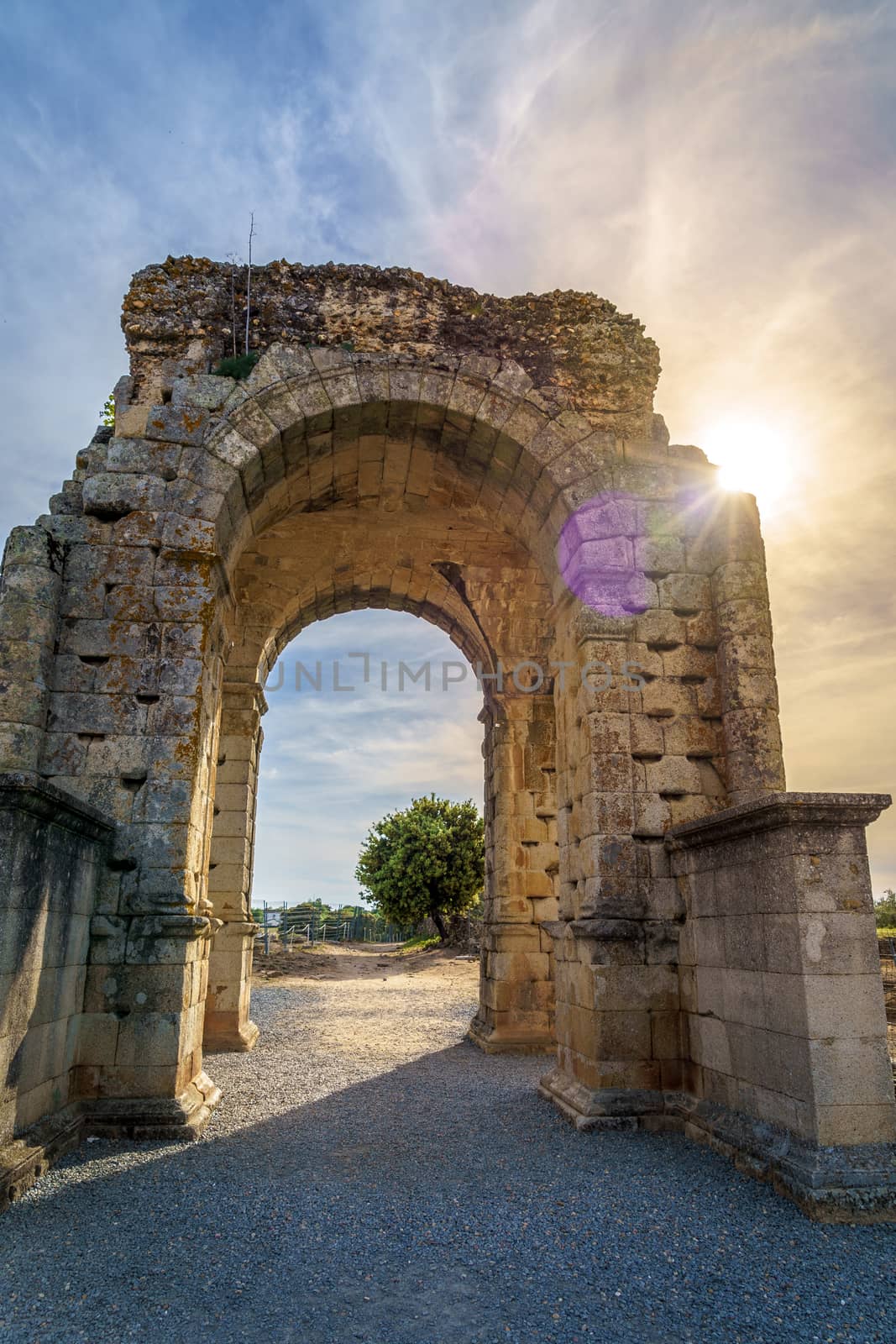 Arch of Caparra, ancient roman city of Caparra in Extremadura, Spain by tanaonte