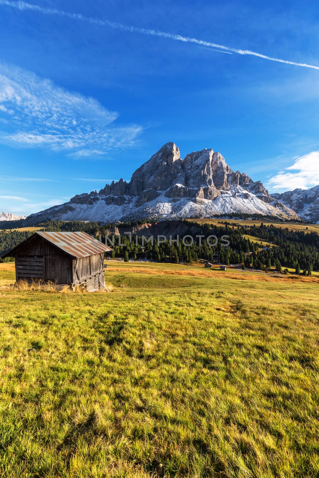 Mountain hut with beautiful peak on the background at passo Erbe by necro79