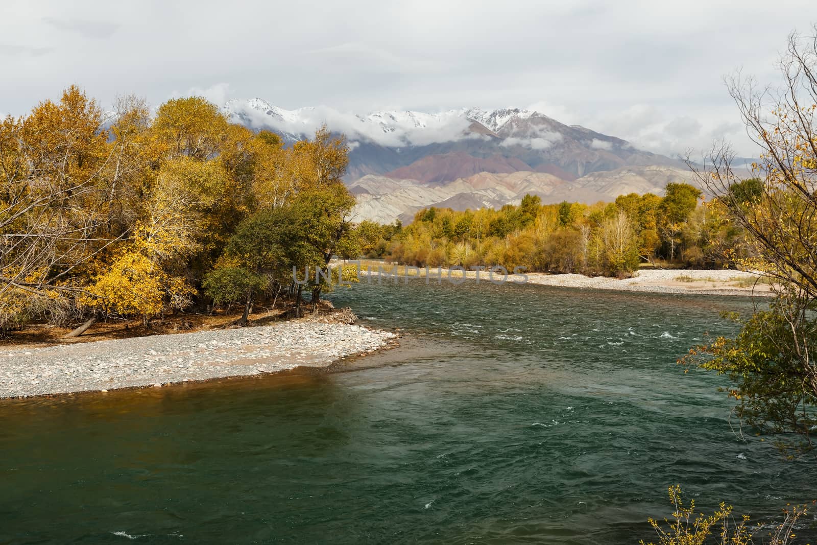Kokemeren river in Kyrgyzstan, mountain river autumn landscape