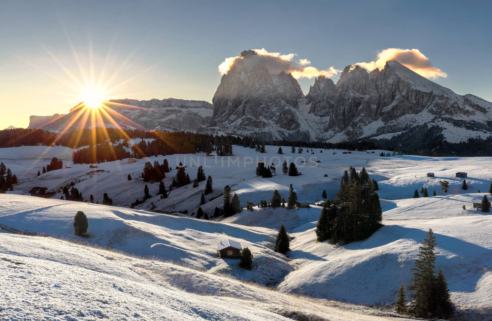 Picturesque sunrise panoramic view on Odle - Geisler mountain group, Seceda and Seiser Alm (Alpe di Siusi). Beautiful morning autumn scenery in the Dolomite Alps, South Tyrol, Italy.