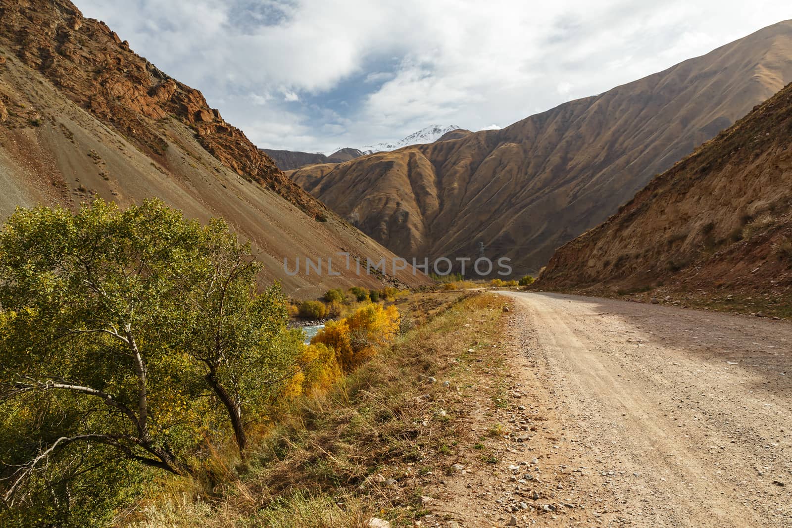 mountain road along the Kokemeren river in Naryn Region of Kyrgyzstan.