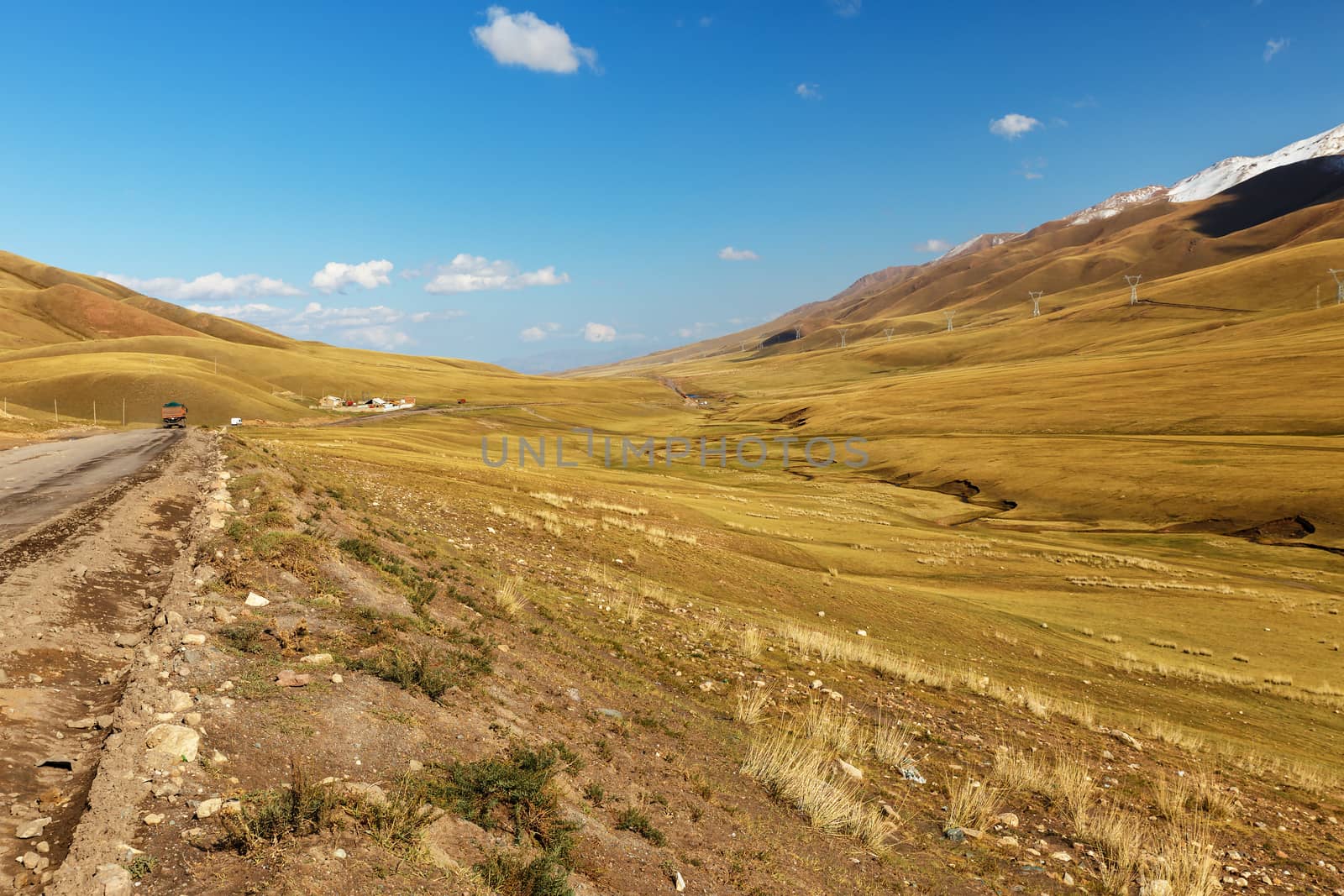 A367 highway passing in the Naryn region of Kyrgyzstan. road to the Kyzart pass.