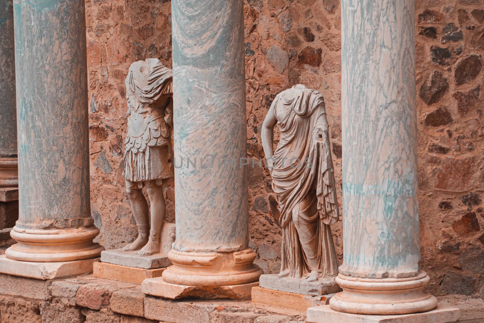 Scaenae frons in the Antique Roman Theatre in Merida. Panorama image. The Archaeological Ensemble of Merida is declared a UNESCO World Heritage Site Ref 664. Orange and teal style