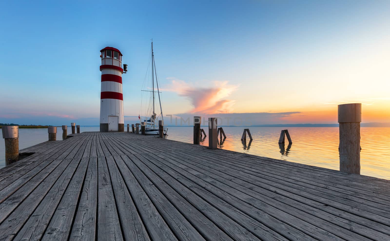 Beautiful sunset at lighthouse, Austria by necro79