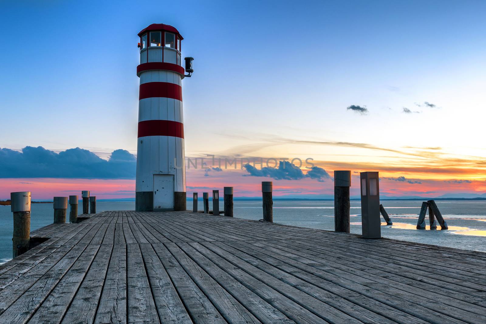 Lighthouse during winter sunset, Podersdorf am see, Austria by necro79