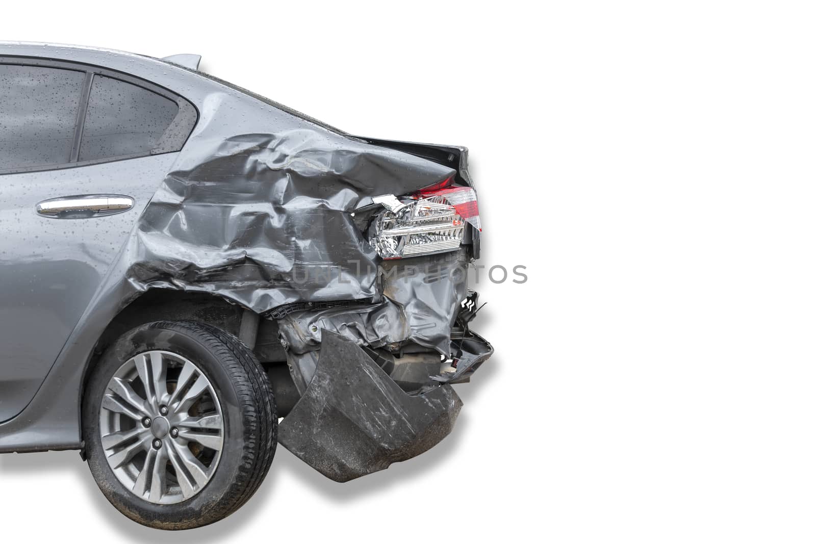 In raining day back side of  gray color car damaged and broken by accident on road parking can not dirve any more. isolate on white background. Save with cliping path