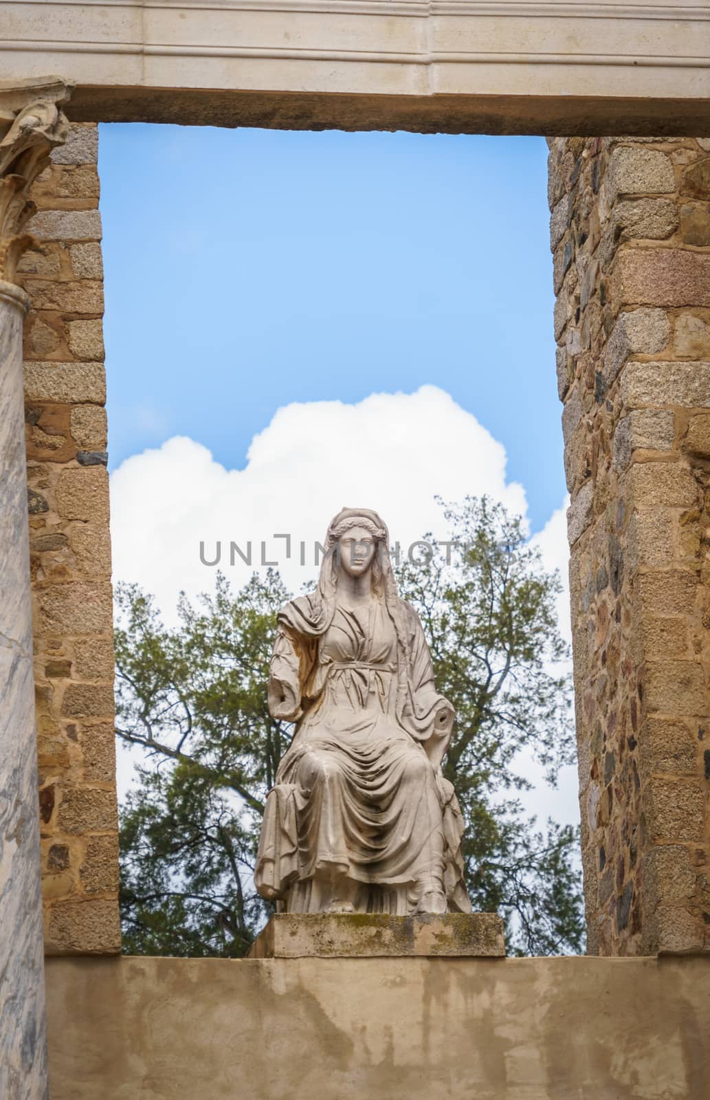 Statue of the goddess Ceres at the Roman Theatre in Merida, Spain by tanaonte