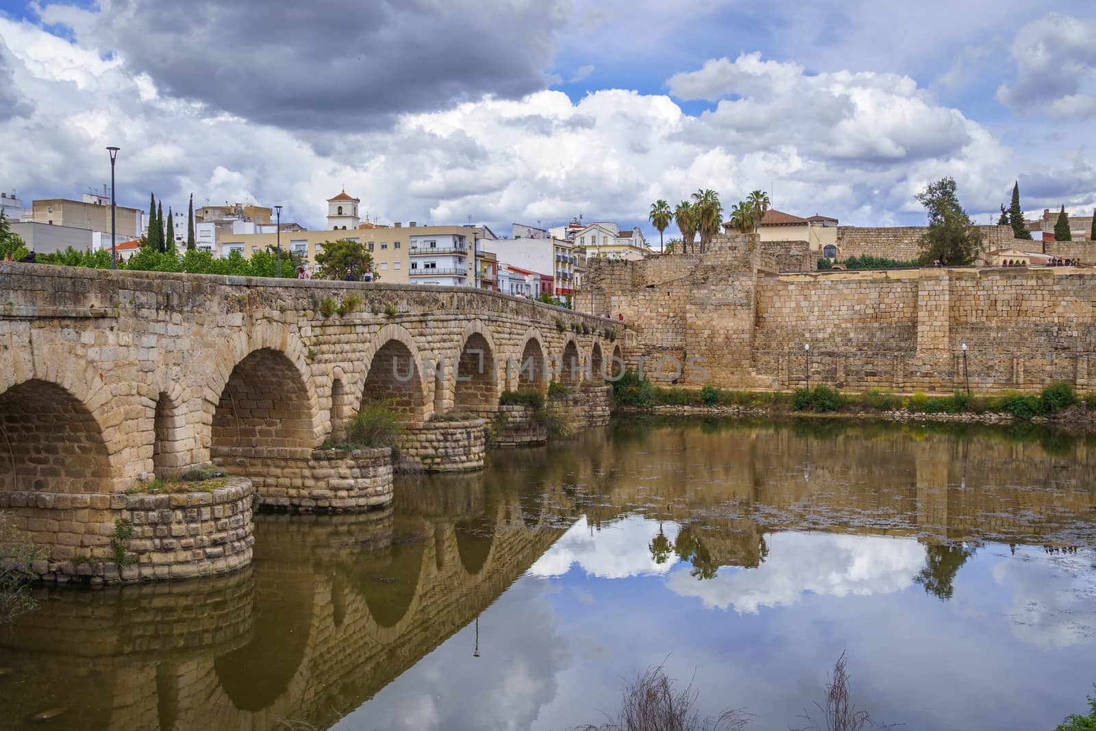 View of the Roman bridge of Merida with its reflection on the Guadiana river. Merida. Spain.The Archaeological Ensemble of Merida is declared a UNESCO World Heritage Site Ref 664