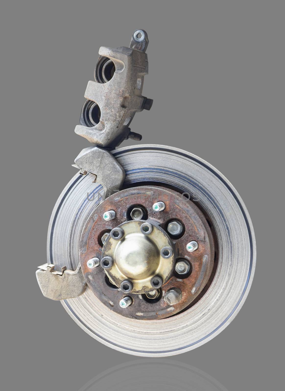 Front disc brake with brake caliper open cover caliper process of new break pad. Isolate on gray background. Save with clipping path.