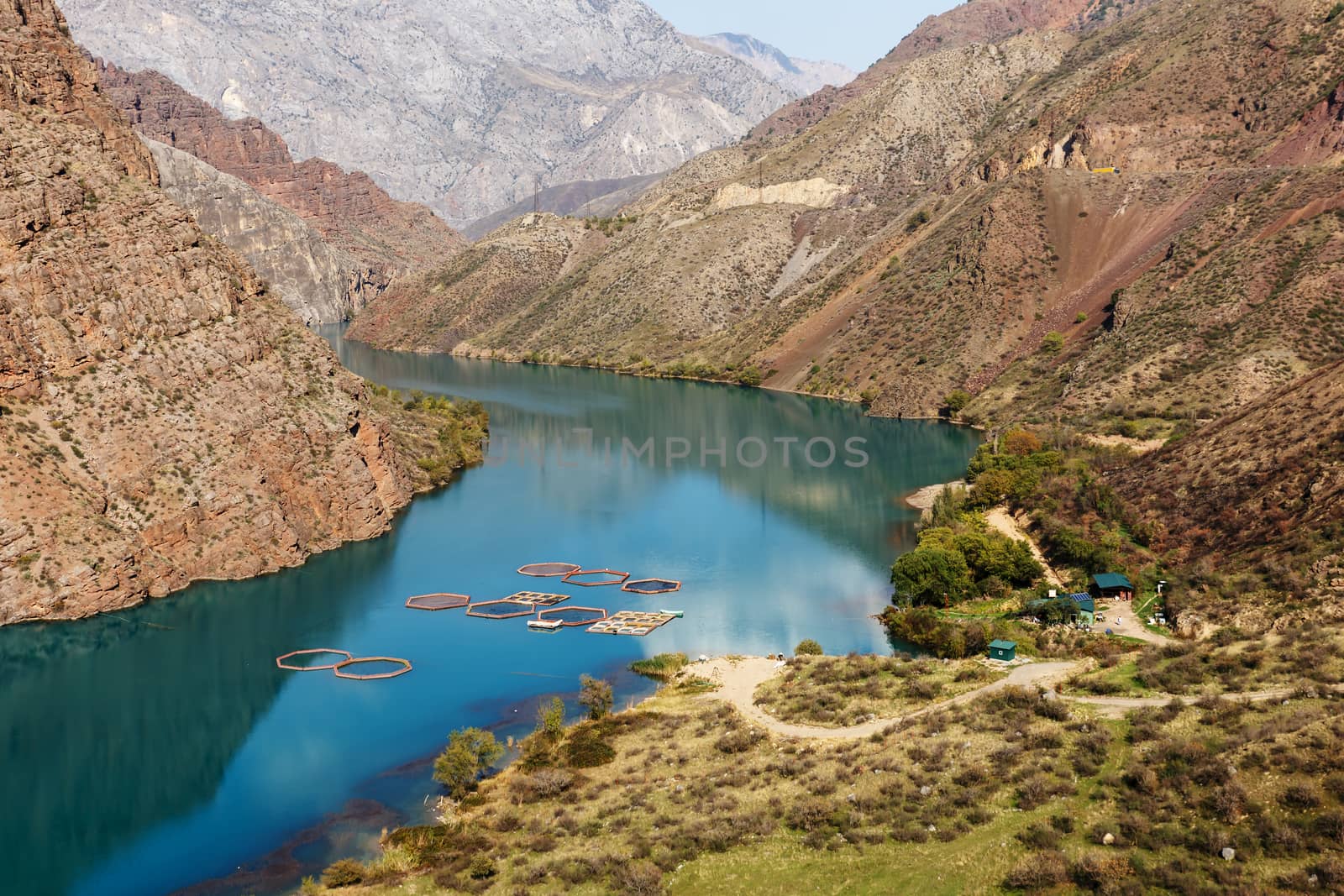 Naryn River in the Tian Shan mountains in Kyrgyzstan. fish farm on the river.