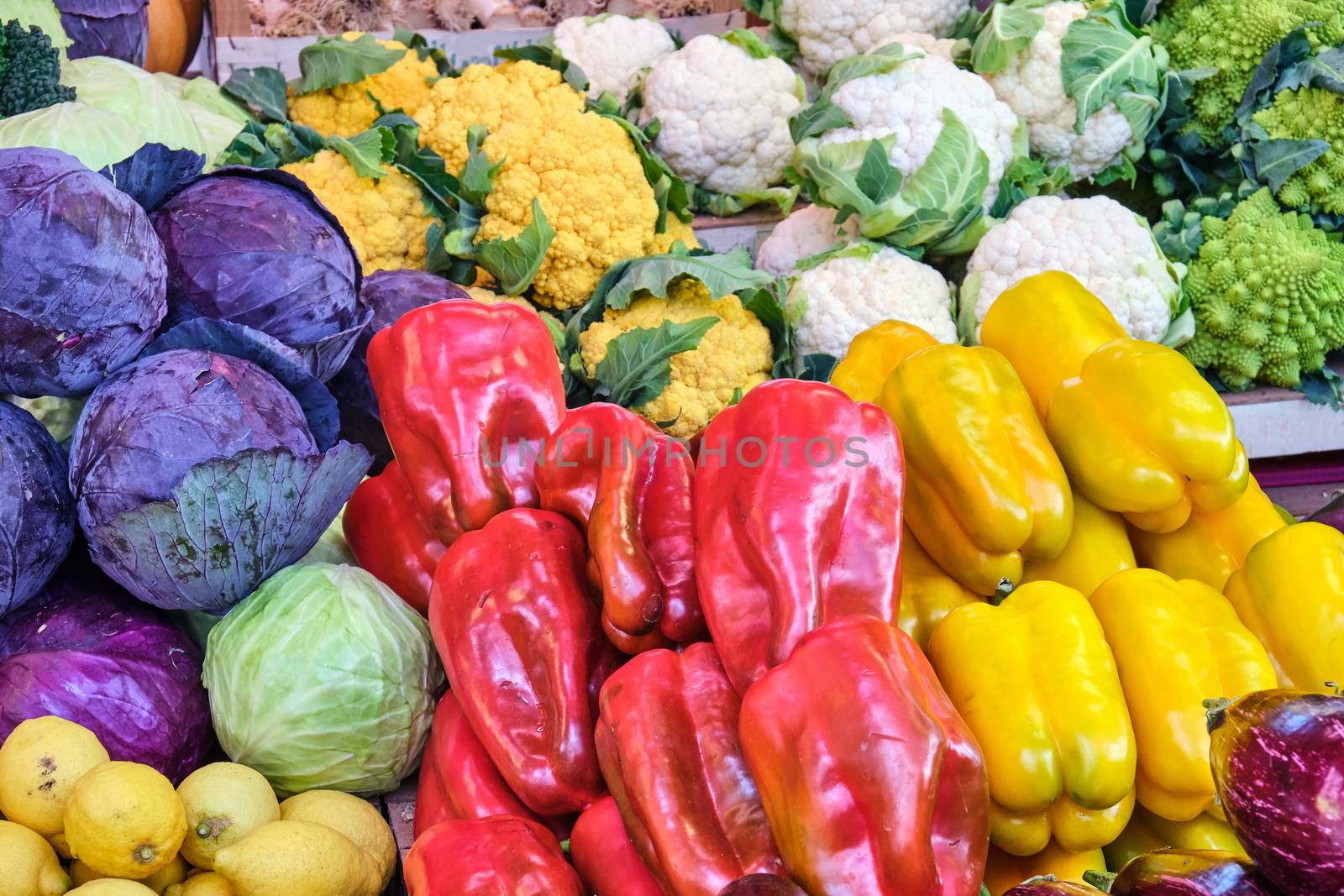 Bell pepper, cabbage and different kinds of broccoli for sale at a market in Rome