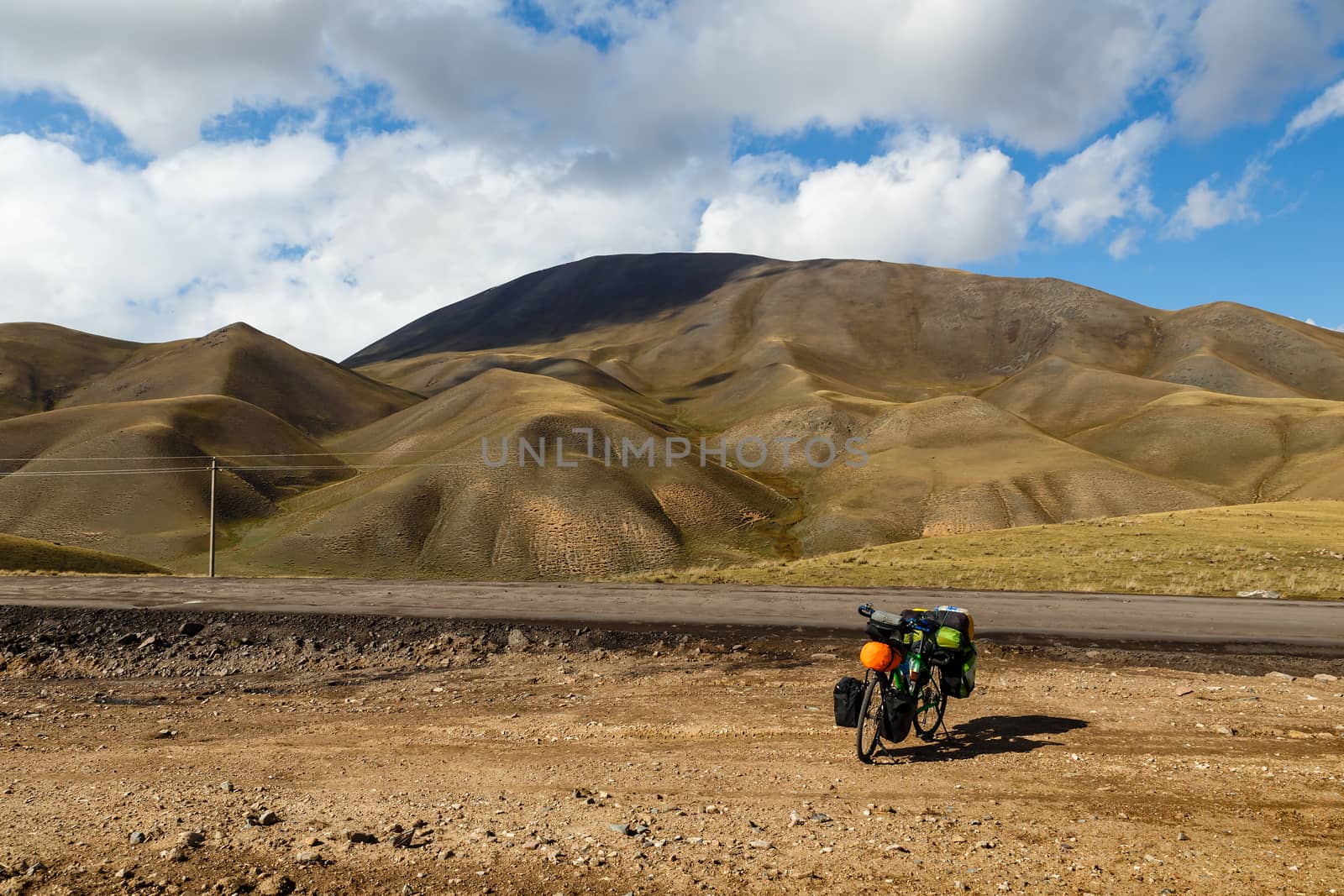 bicycle with bags, landscape, Kyrgyzstan by Mieszko9