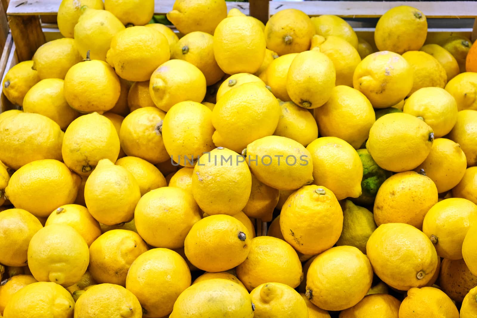 Pile of lemons for sale at a market