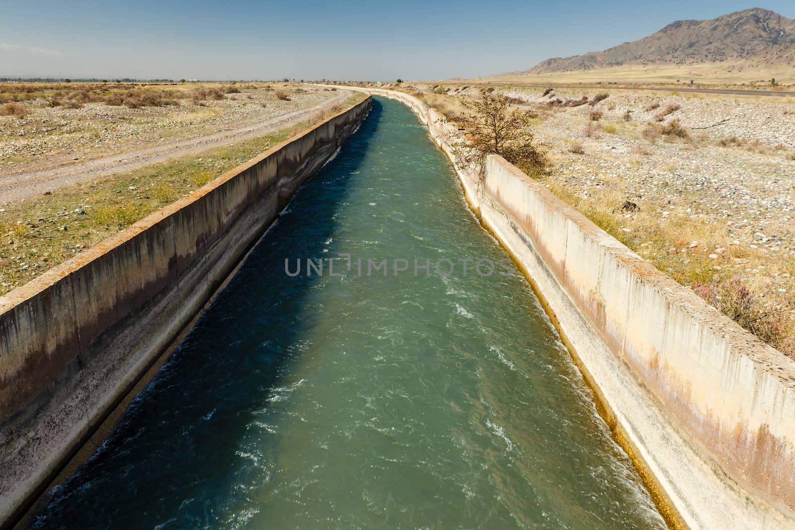water flowing in an irrigation canal in Kyrgyzstan, Irrigation canal Chuy Province