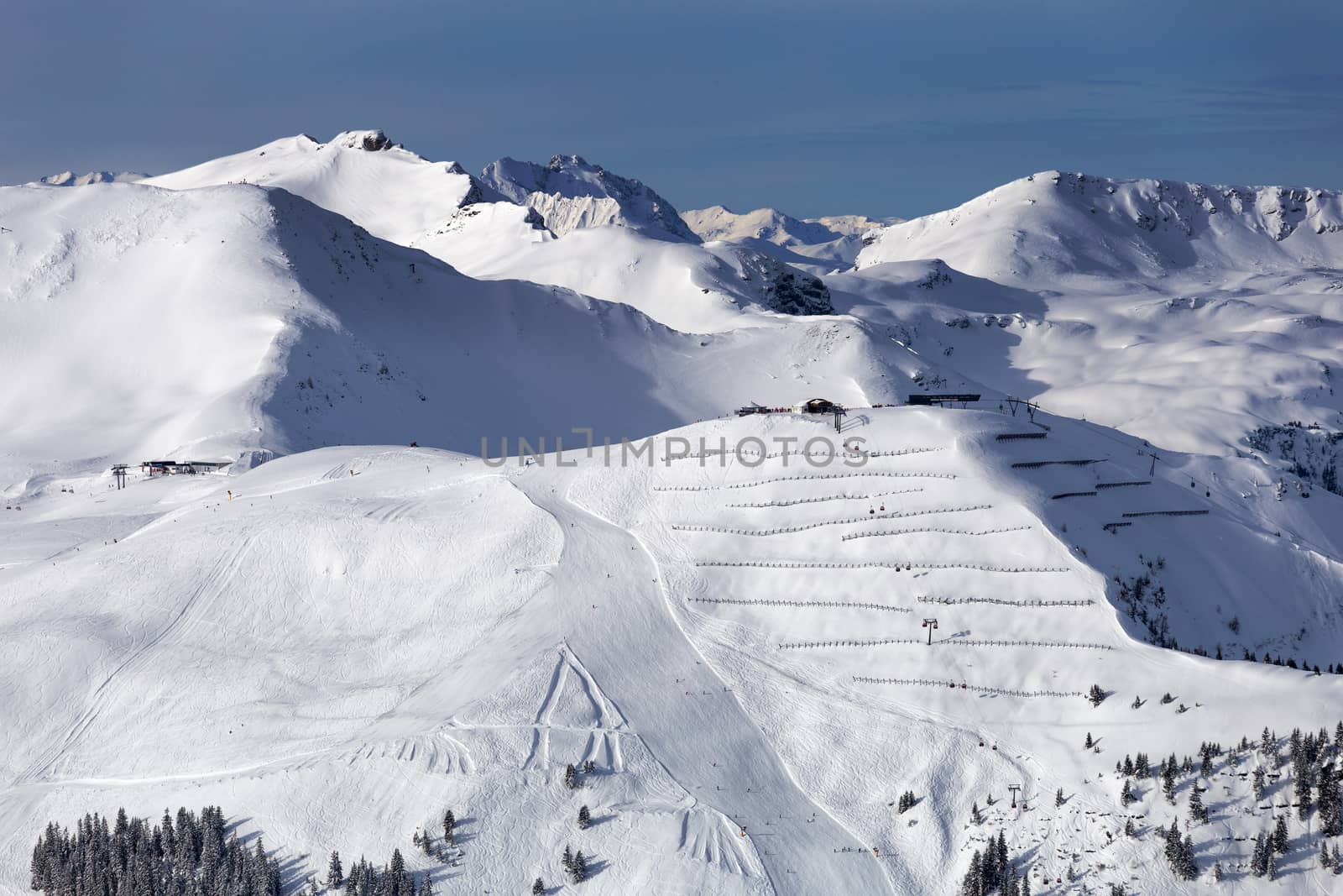 Snowy winter landscape of a ski resort in the Alps by necro79