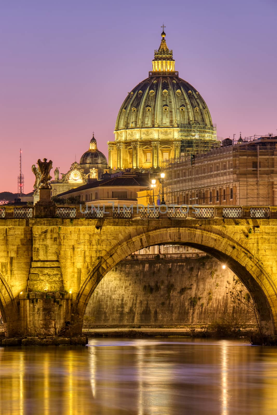 The St. Peters Basilica in the Vatican City, Italy, at twilight