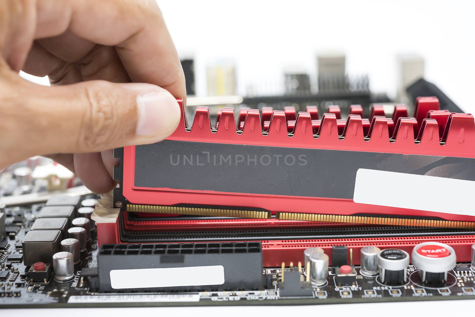 Close up hand install high performance  DDR3 ram to ram slot 